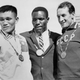 Johnson (c.) after a gold-medal performance at the Rome games in 1960.